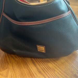 Dooney & Bourke Black Pebbled Leather Hobo with Brown Trim and Gold Plaque